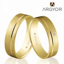 Imagen de pareja de alianzas de boda Argyor con diamante