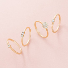 Cuatro anillos de compromiso en oro rosa de 18k con diamantes
