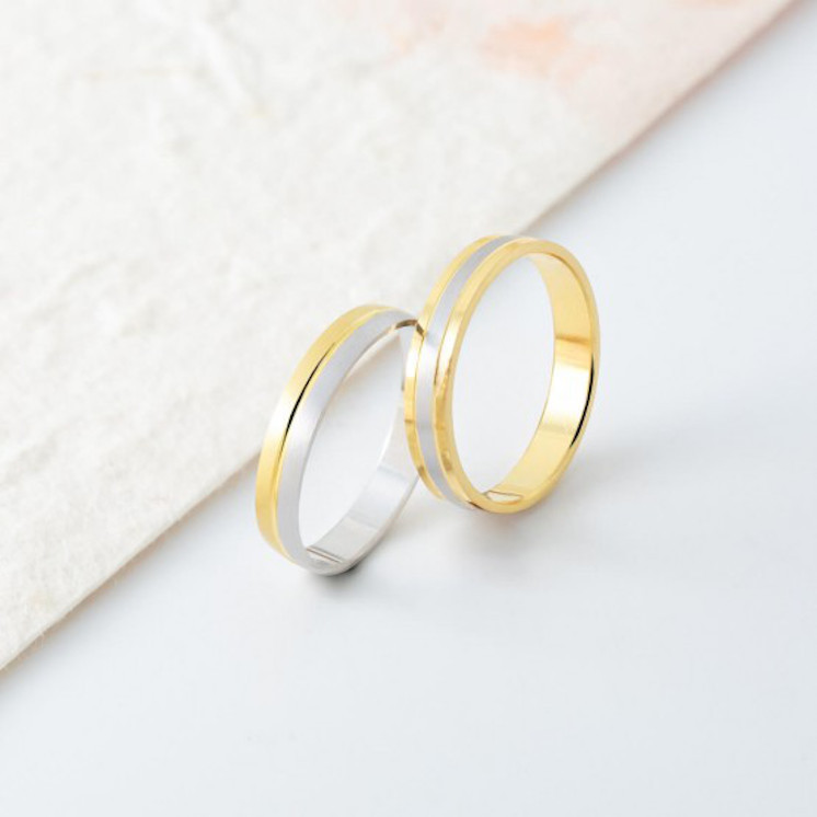 Imagen de anillos de boda distintos oro bicolor